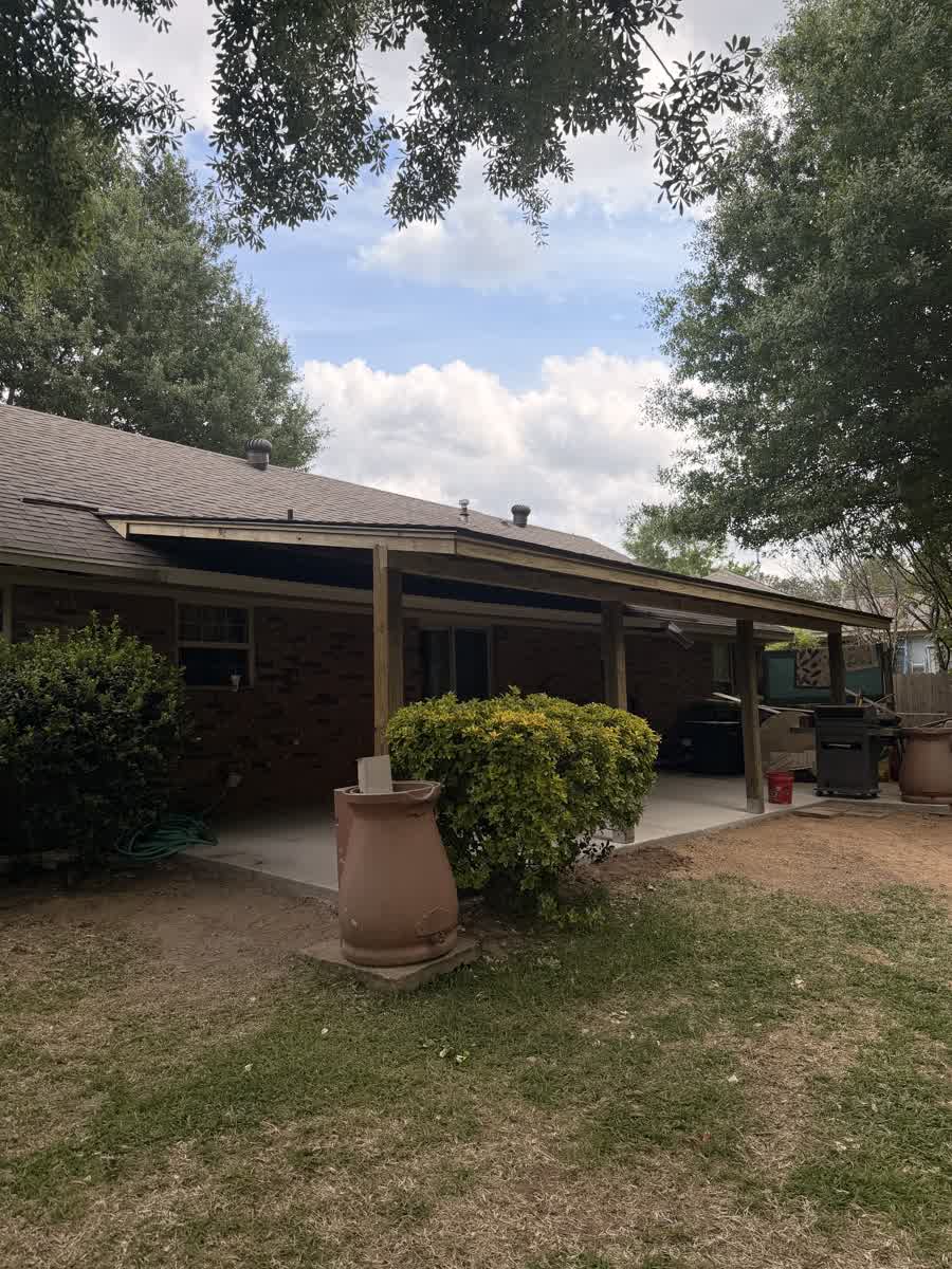 Back exterior of a Mississippi home showing gutter line and downspout