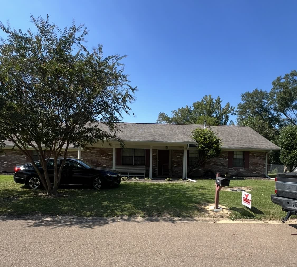 Brick rancher with completed shingle replacement