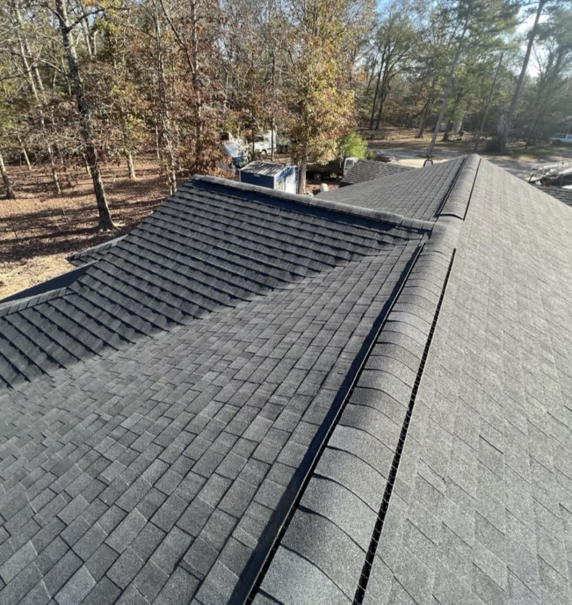 Close-up of crisp ridge cap on a finished asphalt roof